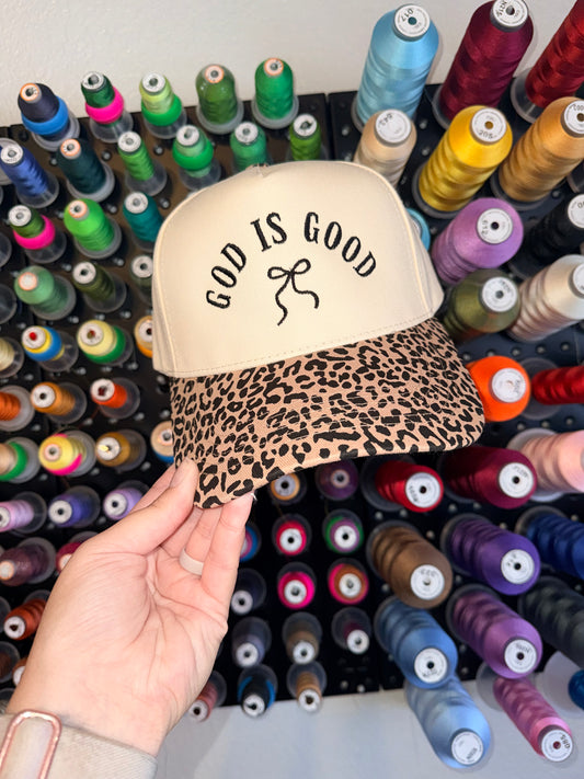 God is Good Bow - Embroidered Cheetah Trucker Hat